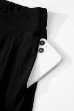 Color black Solid Color Textured Crossed Waist Loose Pants