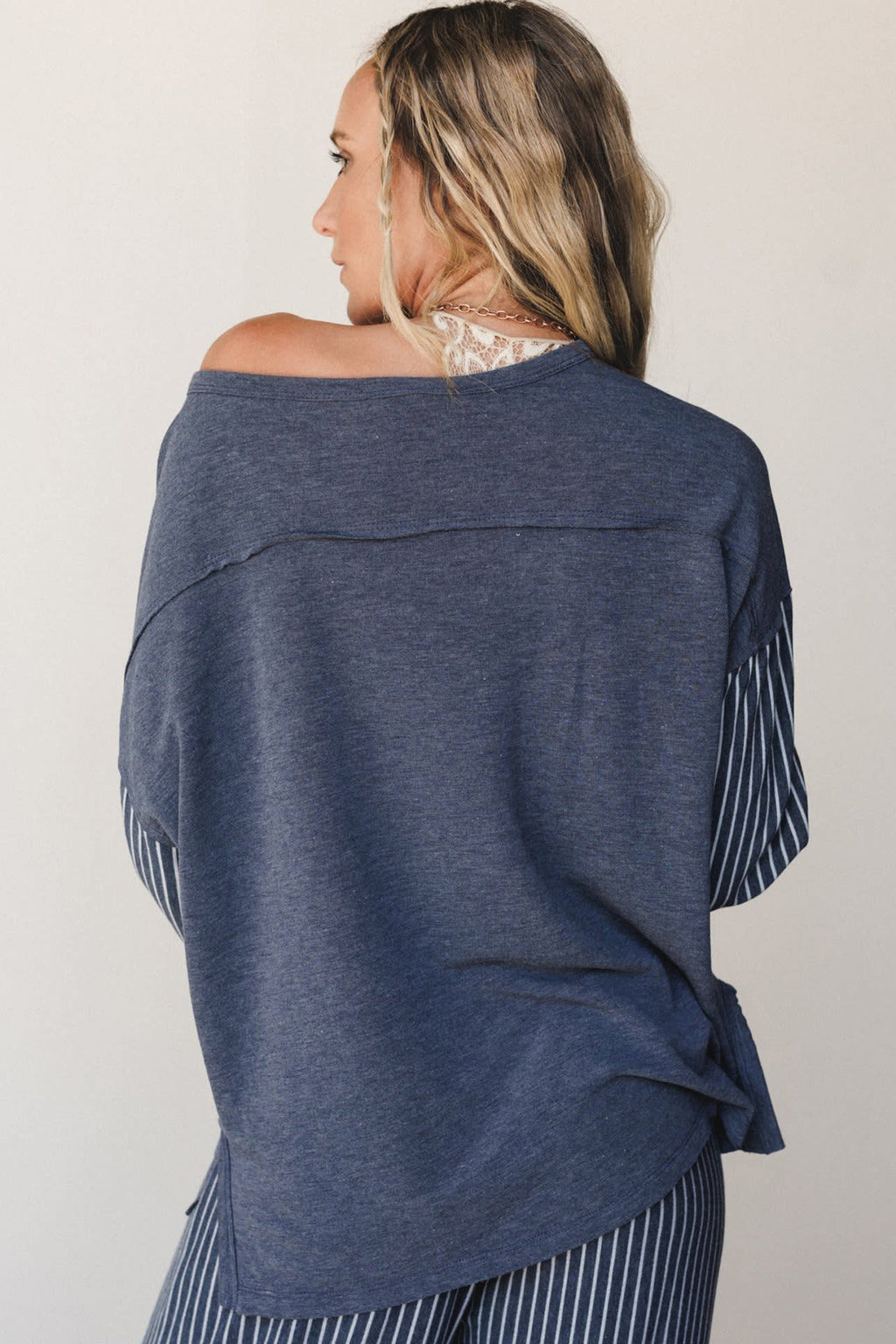 Raw seam patchwork long sleeve top and casual pants set from Dear-Lover, featuring a two-piece patchwork design and pocket details.