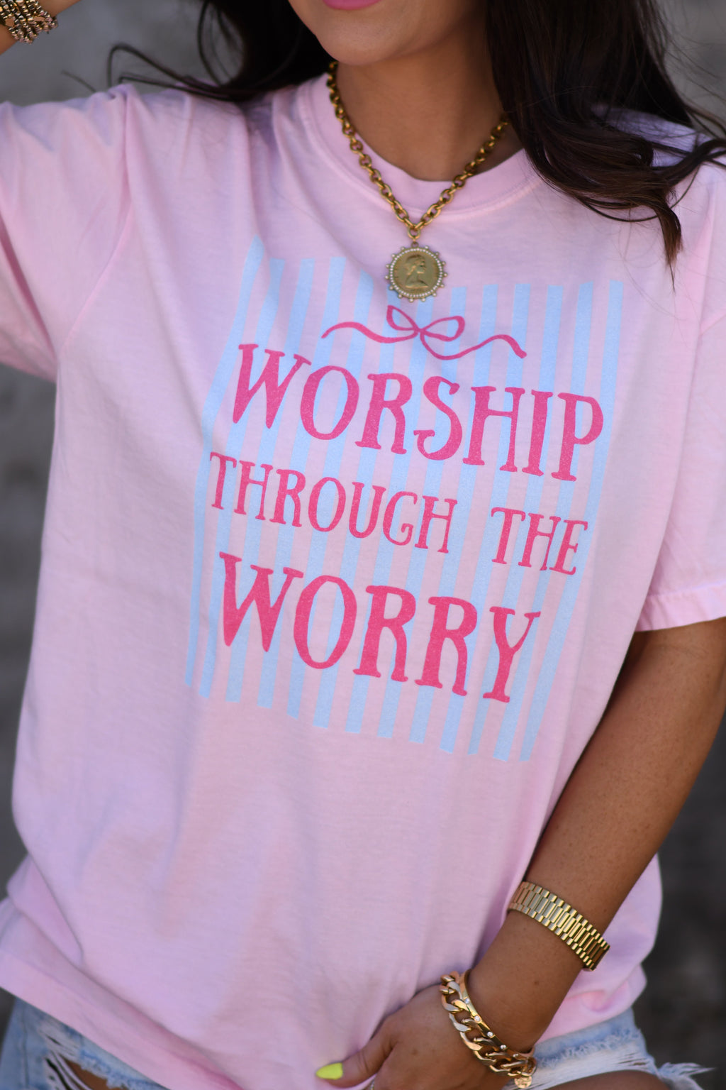 WORSHIP THROUGH THE WORRY STRIPED BOW TEE