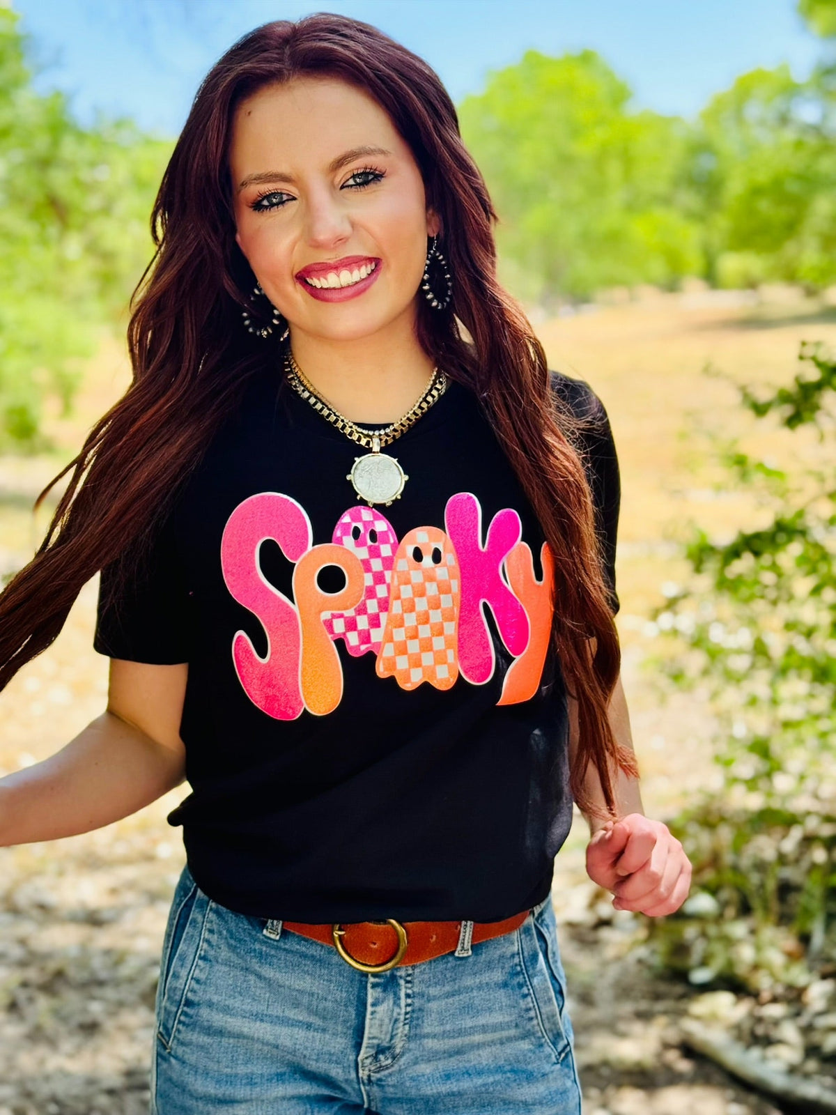 Sparkly black Spooky Tee in glitter puff lettering by Texas True Threads, featuring a fun Halloween-themed design.