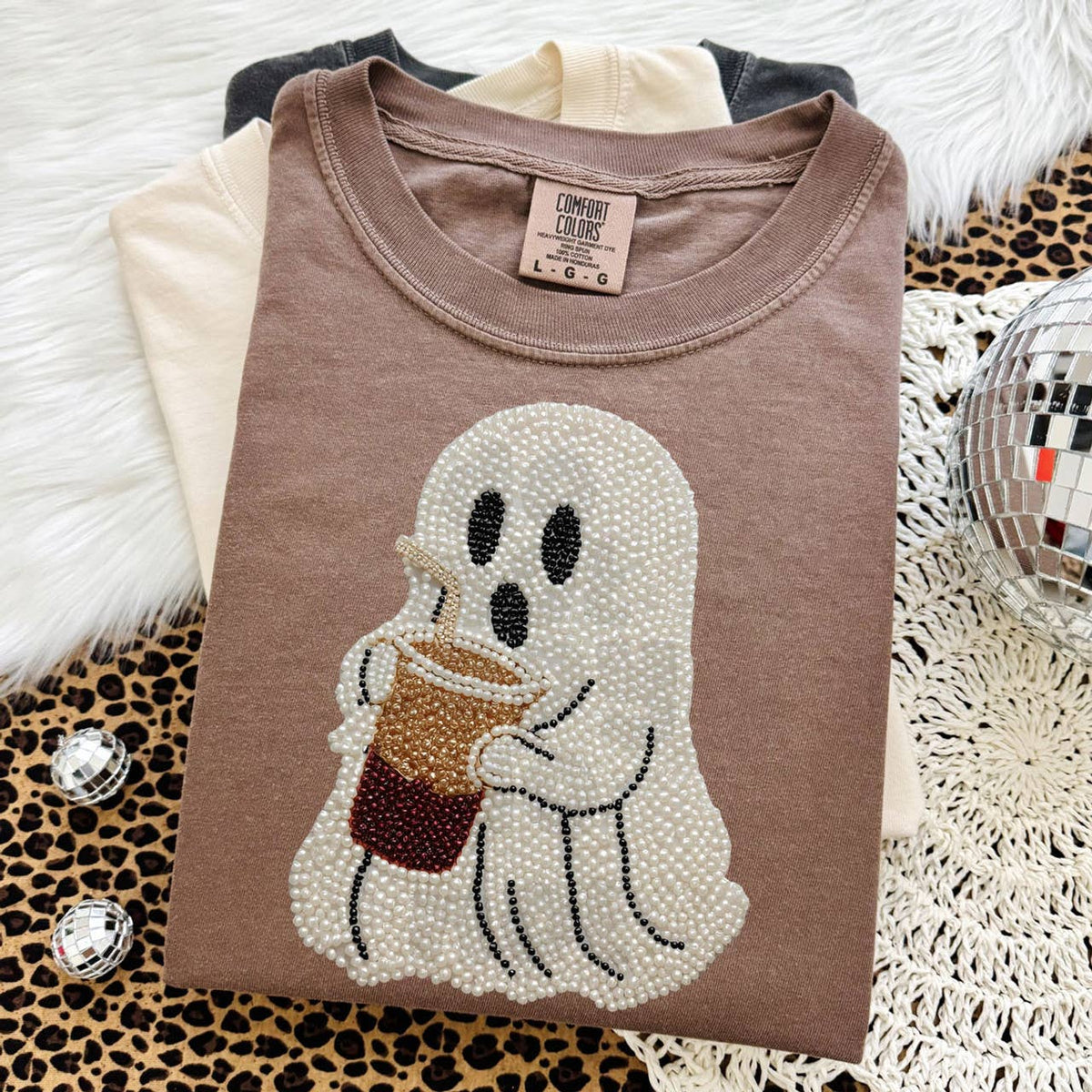 Womens Faux Pearl Ghost With Coffee Tee by Trendy Tee Co., featuring a ghost graphic with faux pearls and coffee cup design.
