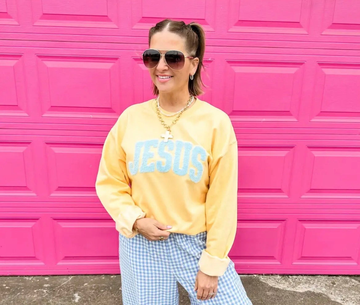 Jesus Fluffy Patch on yellow haze sweatshirt by Al + Gray Graphic Tees, featuring a detailed embroidered Jesus patch on the front.