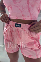 Pink camo boxer shorts from Bird & Co Wholesale Tees, with a comfortable fit and camouflage pattern.
