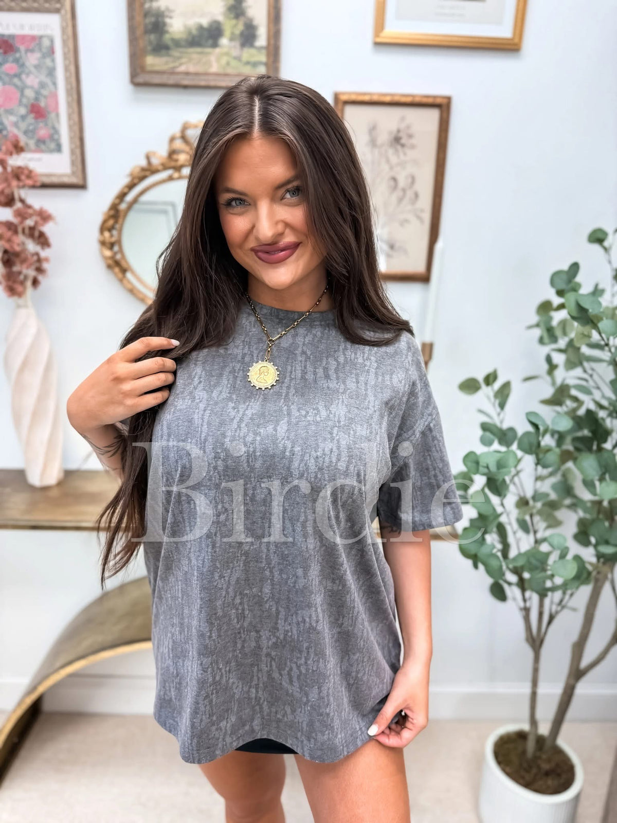 Black oversized camo T-shirt by Bird & Co Wholesale Tees featuring black and white camouflage pattern and relaxed fit.