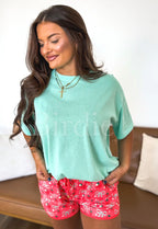 Mint Relaxed Boyfriend Tee by Bird & Co Wholesale Tees, soft casual shirt shown on a hanger.