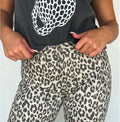 BLAKELEY cheetah and leopard print non-distressed jeans, stylish bottoms with animal print pattern and classic denim fit.