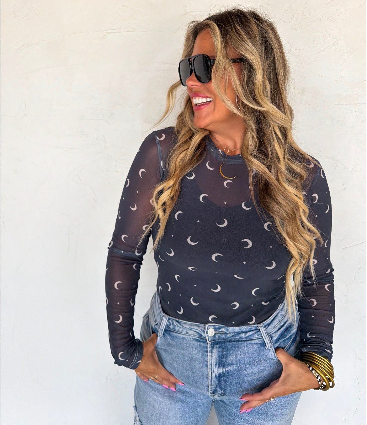 Blakeley Moon Child Dress It Up Top, lightweight fabric, stylish design, in a light color, perfect for casual or dressy occasions.