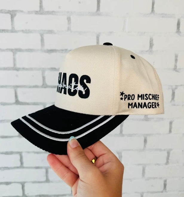 Chaos Coordinator trucker hat by Broke Babe Wholesale, featuring a mesh back and bold embroidered text on the front.