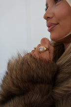 Elegant Carly Ring by Chansuttpearls featuring a delicate pearl design on a silver band.
