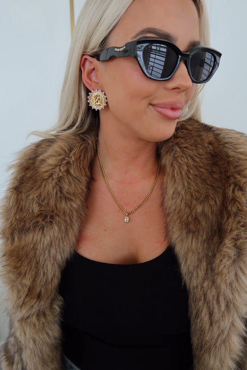 Elegant Audrey Necklace by Chansuttpearls featuring a delicate string of lustrous pearls on a fine chain.