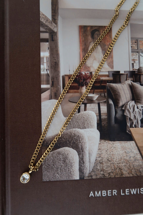 Elegant Audrey Necklace by Chansuttpearls featuring a delicate pearl design on a fine chain.