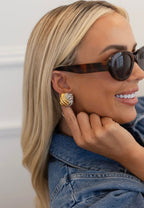 Elegant Grace Earrings by Chansuttpearls featuring shiny pearls and delicate design for a sophisticated look.