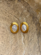 Chansuttpearls Hannah earrings featuring elegant pearl drop design with silver hooks, ideal for sophisticated accessories.