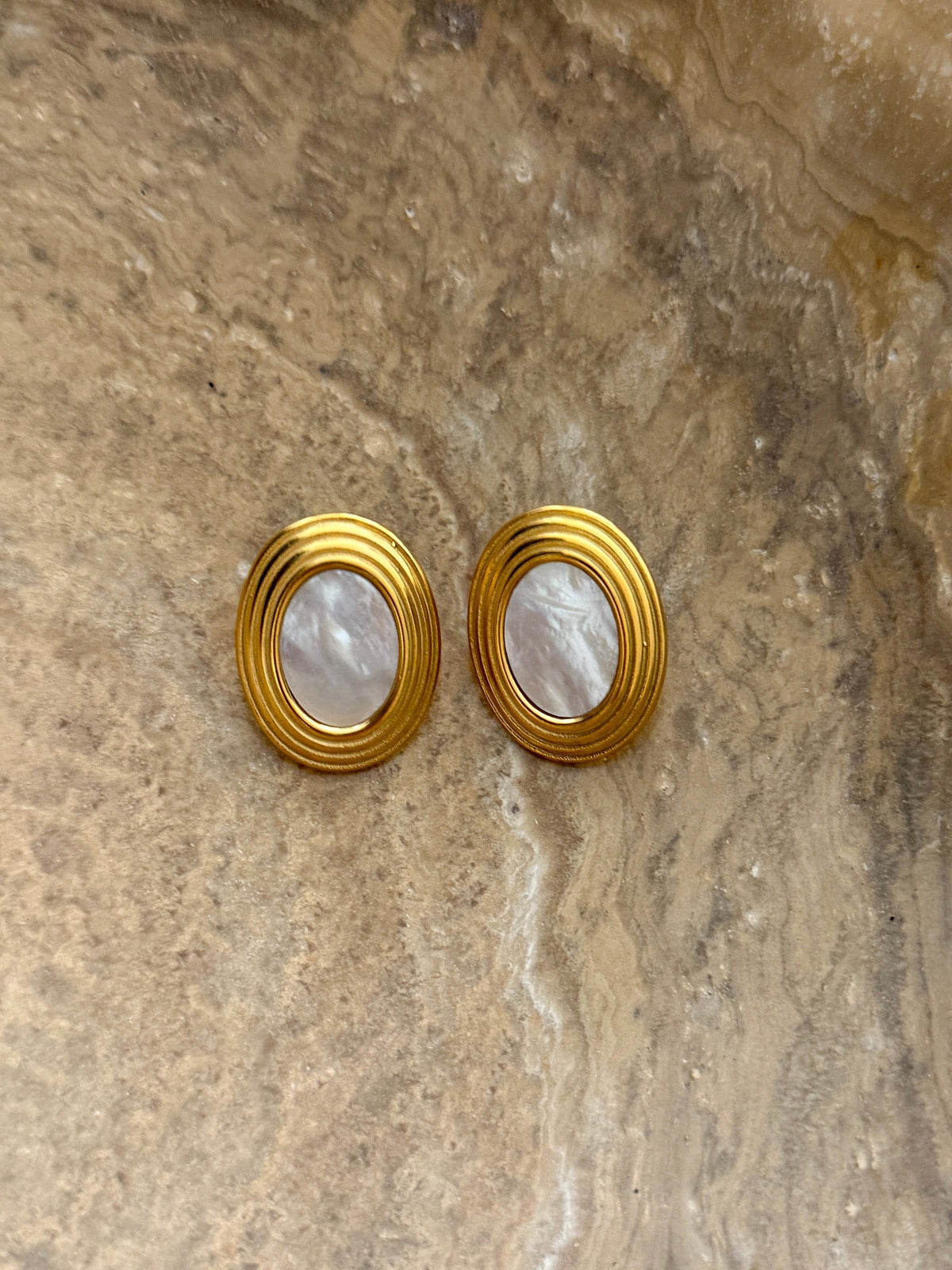 Chansuttpearls Hannah earrings featuring elegant pearl drop design with silver hooks, ideal for sophisticated accessories.