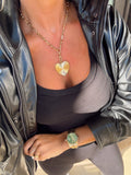 Elegant Haven Necklace by Chansuttpearls featuring a delicate pearl strand and silver clasp on a white background.