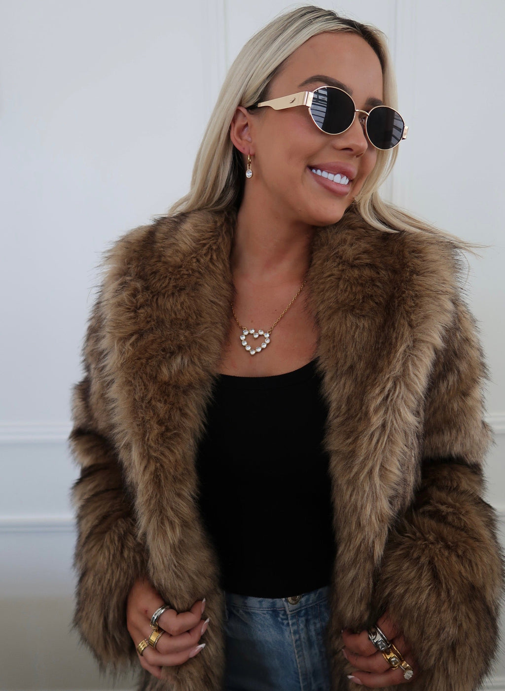 Large diamond heart necklace from Chansuttpearls featuring a sparkling heart-shaped pendant on a delicate chain.