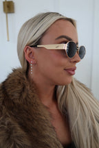 Chansuttpearls Lola earrings featuring elegant pearl drop design with gold accents, perfect for stylish occasions.