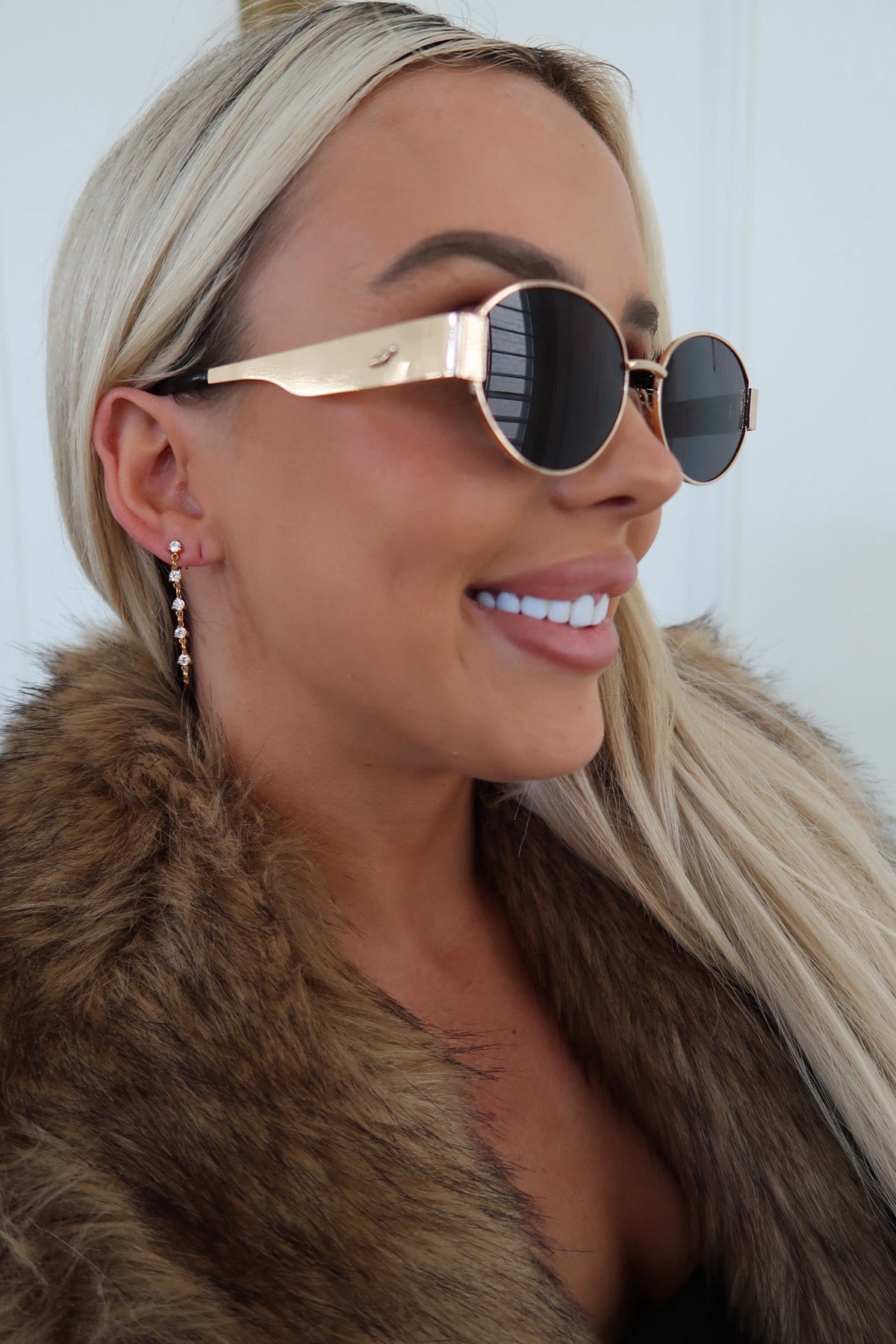 Chansuttpearls Lola earrings featuring elegant pearl drop design with gold accents, perfect for sophisticated style.
