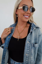 Gold-tone Luxe Cross Necklace by Chansuttpearls, featuring a detailed cross pendant on a delicate chain.