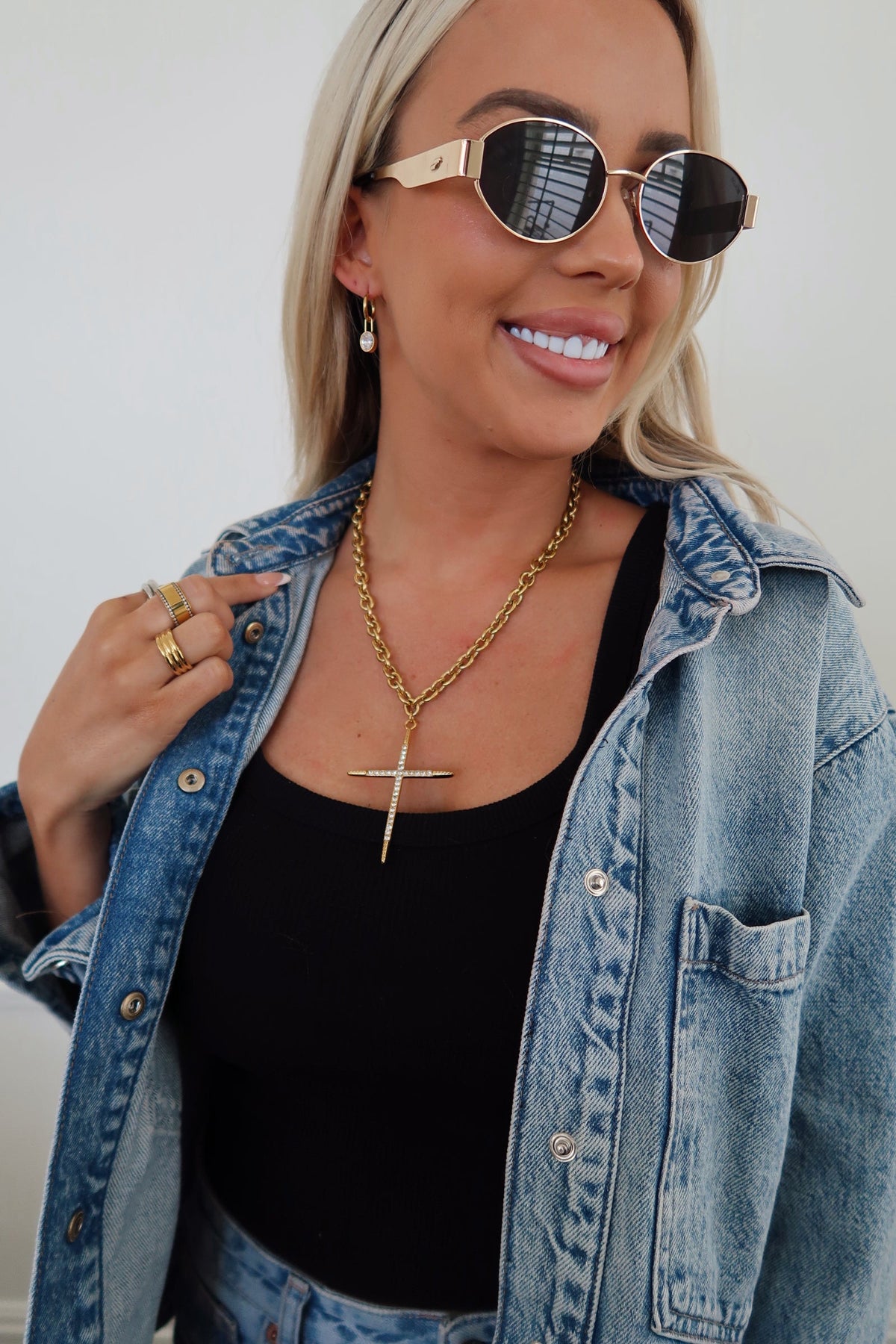 Gold-tone Luxe Cross Necklace by Chansuttpearls, featuring a detailed cross pendant on a delicate chain.