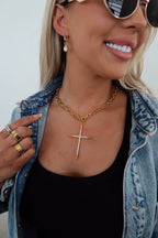 Elegant Luxe Cross Necklace by Chansuttpearls featuring a gold-tone chain and a detailed cross pendant.
