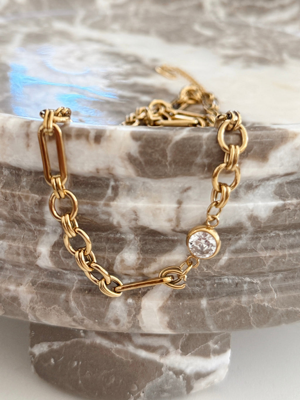 Chansuttpearls Melissa necklace featuring elegant pearl strands and silver clasp on a neutral background.