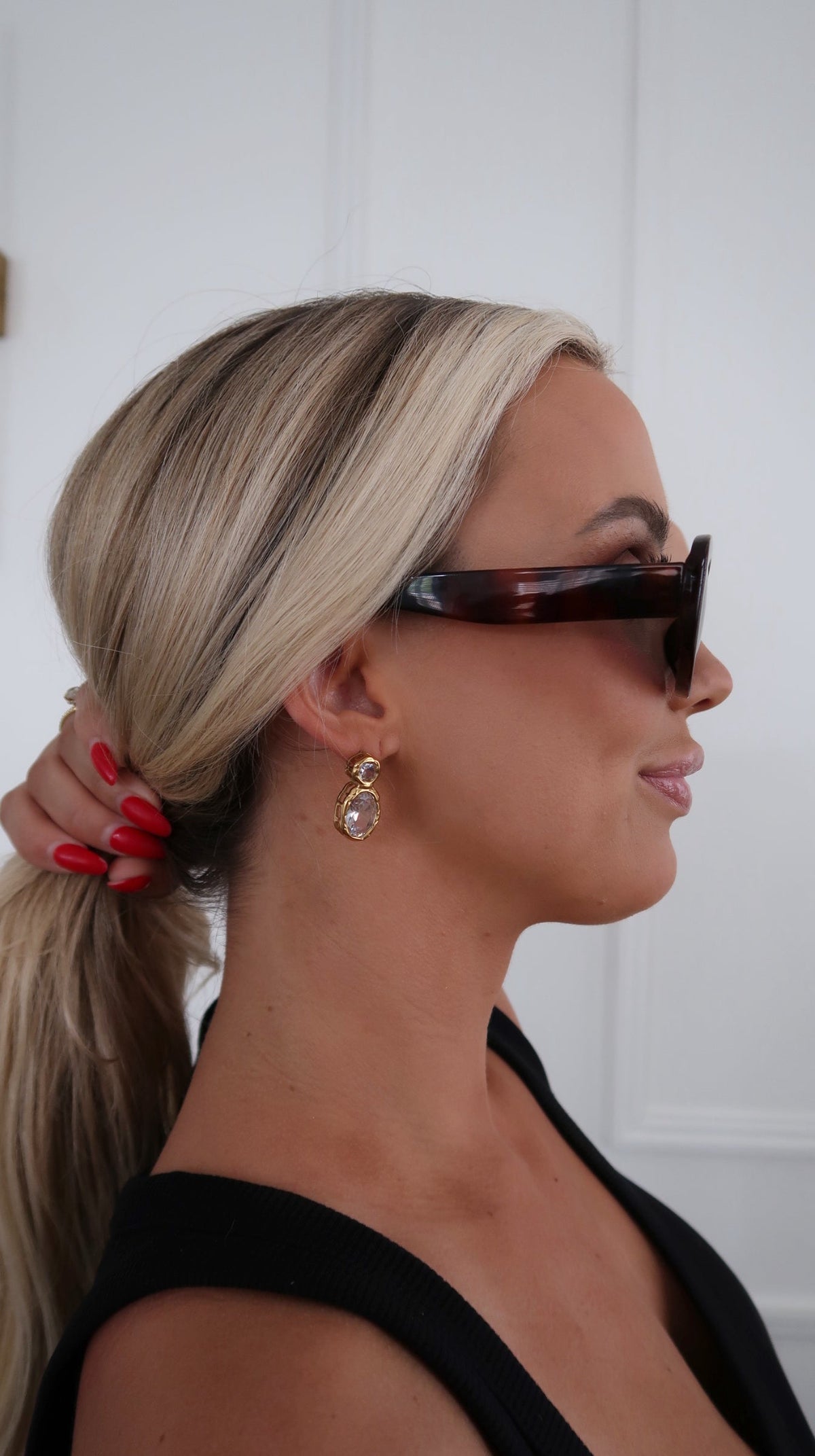 Silver Serenity Earrings by Chansuttpearls featuring elegant pearl accents and a sleek, modern design.