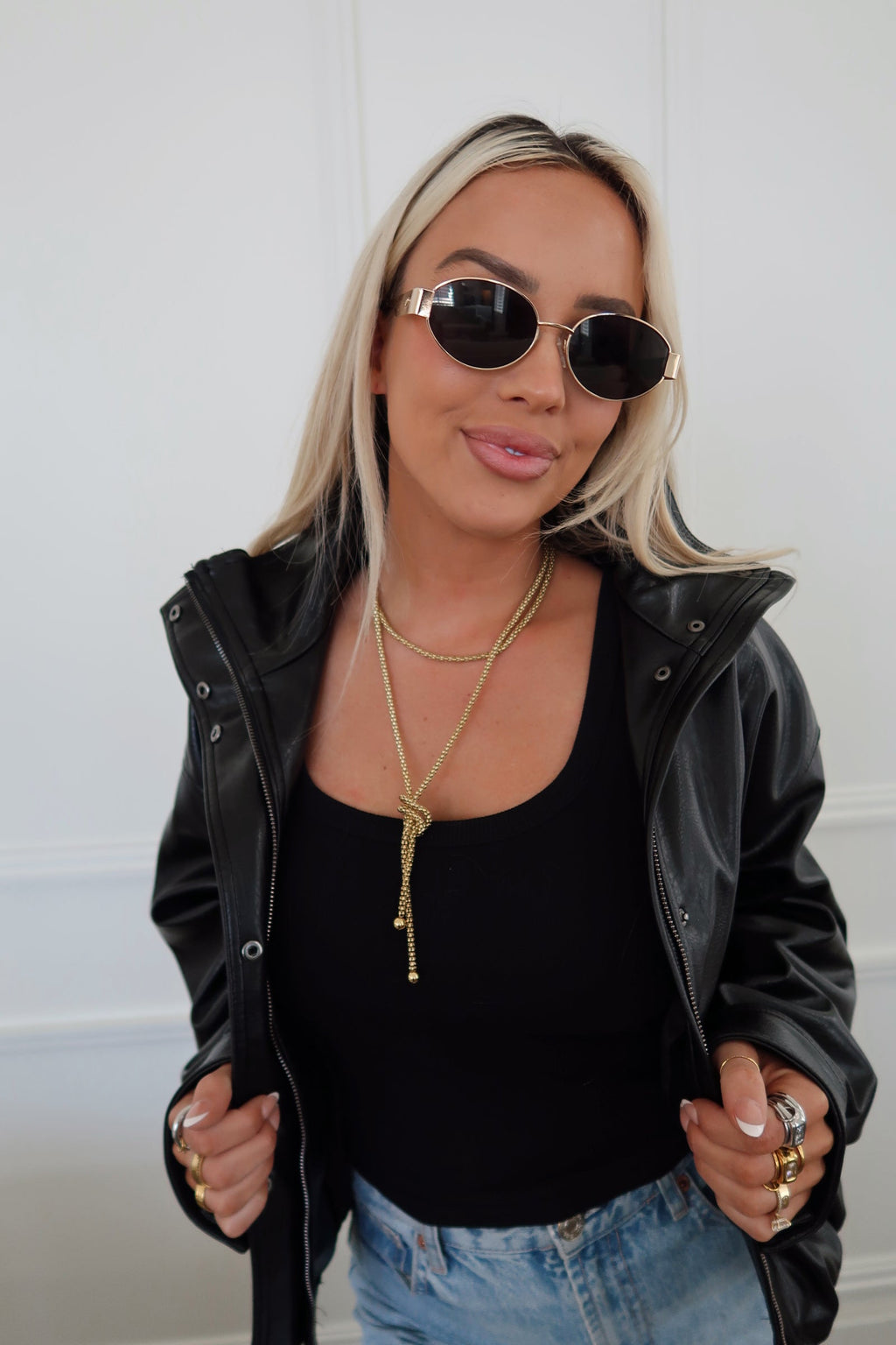 Small Alex necklace by Chansuttpearls featuring a delicate chain with a minimalist pendant on a white background.