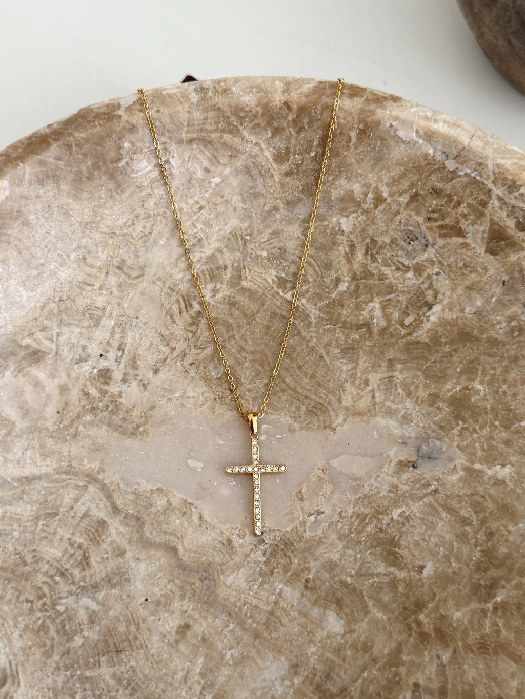 Chansuttpearls The Madi Necklace featuring elegant pearl strands and a stylish clasp, displayed on a neutral background.