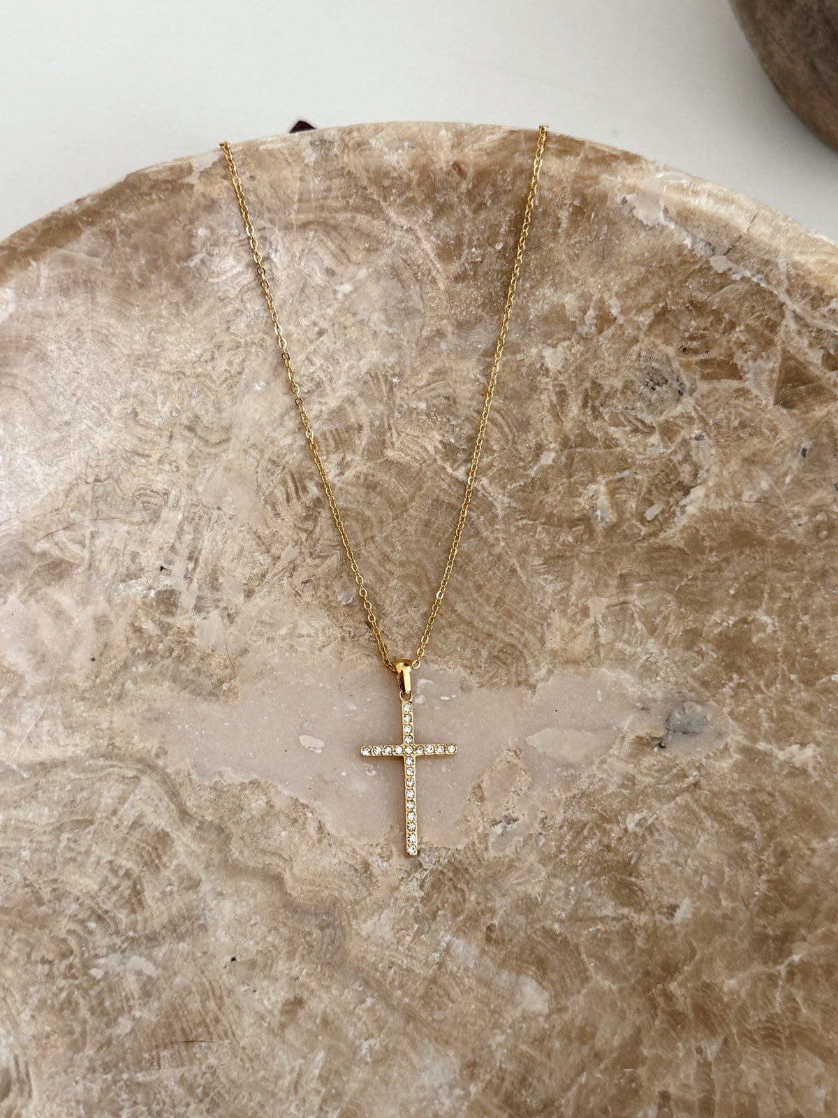 Chansuttpearls The Madi Necklace featuring elegant pearl strands and a stylish clasp, displayed on a neutral background.