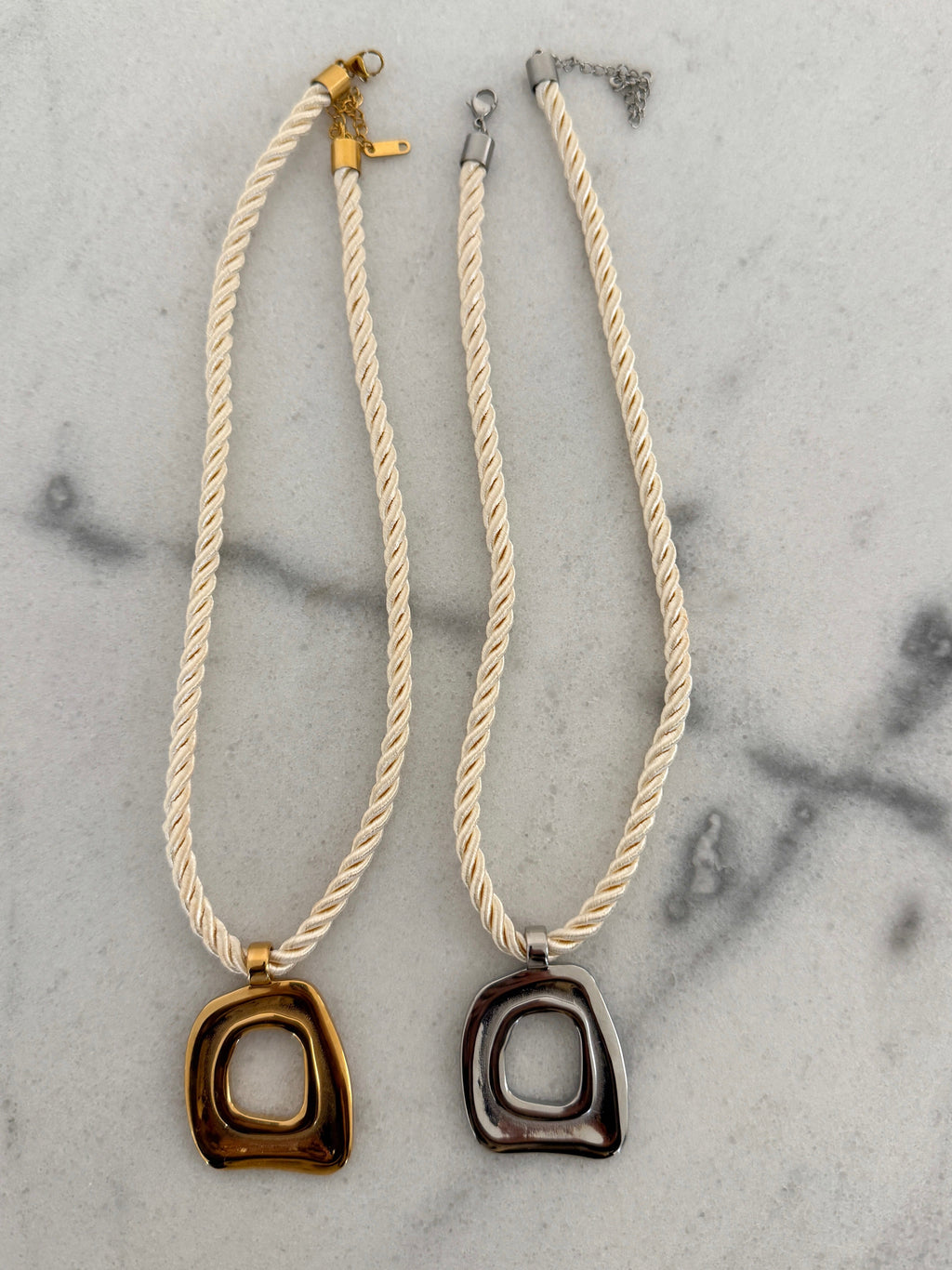 Gold Olivia Necklace by Chansuttpearls featuring a delicate chain with a stylish pendant.