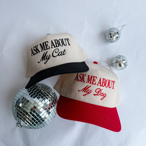 Black and cream Coco & Rho trucker hat with "Ask Me About My" graphic, casual and stylish for everyday wear.