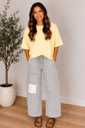 Comfort Co striped barrel jeans featuring a small vertical stripe pattern, classic fit, and mid-rise waist.