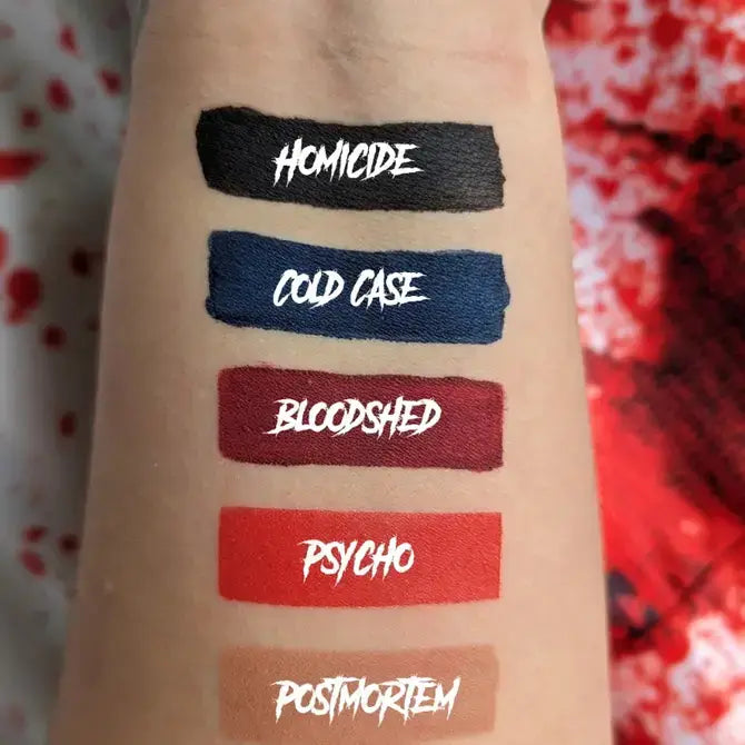 Crypt Cosmetics Cold Case knife-shaped slasher liquid lipstick in black, featuring a sleek, knife-inspired design and matte finish.