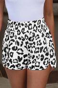 White leopard print high waisted athletic shorts by Dear-Lover, casual bottoms made of lightweight polyester fabric.