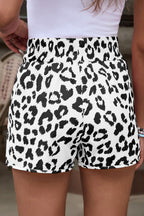 White leopard print high-waisted athletic shorts by Dear-Lover Dropshipping, casual bottoms made of lightweight polyester fabric.
