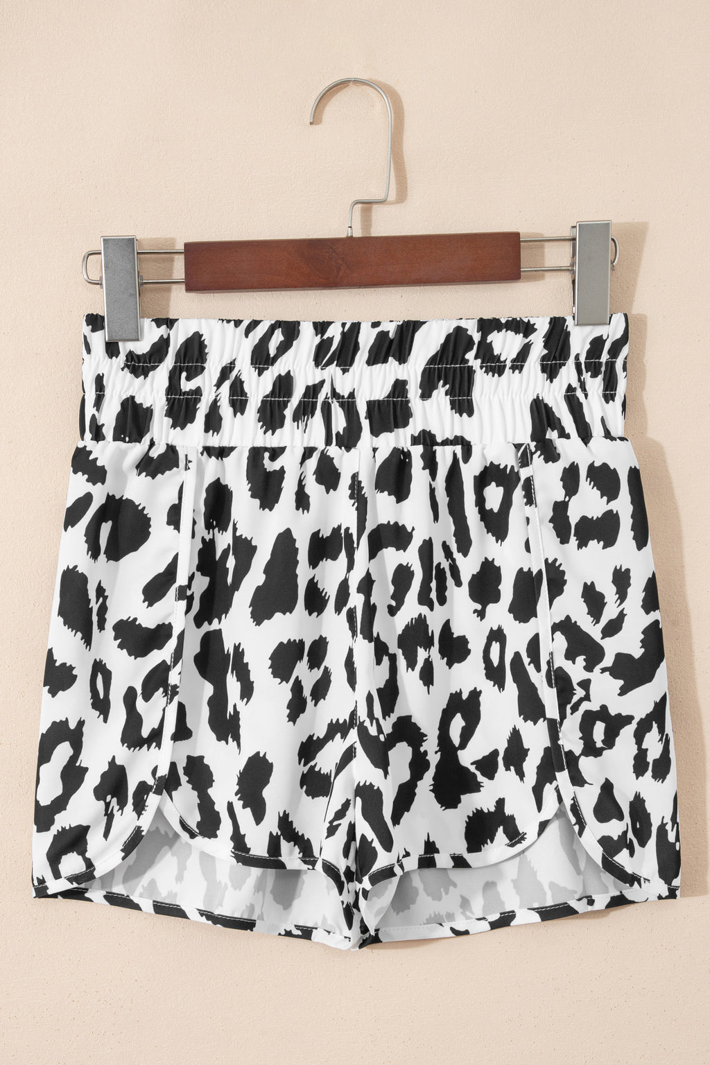 White leopard print high waisted athletic shorts by Dear-Lover, casual bottoms with a comfortable fit and stylish design.