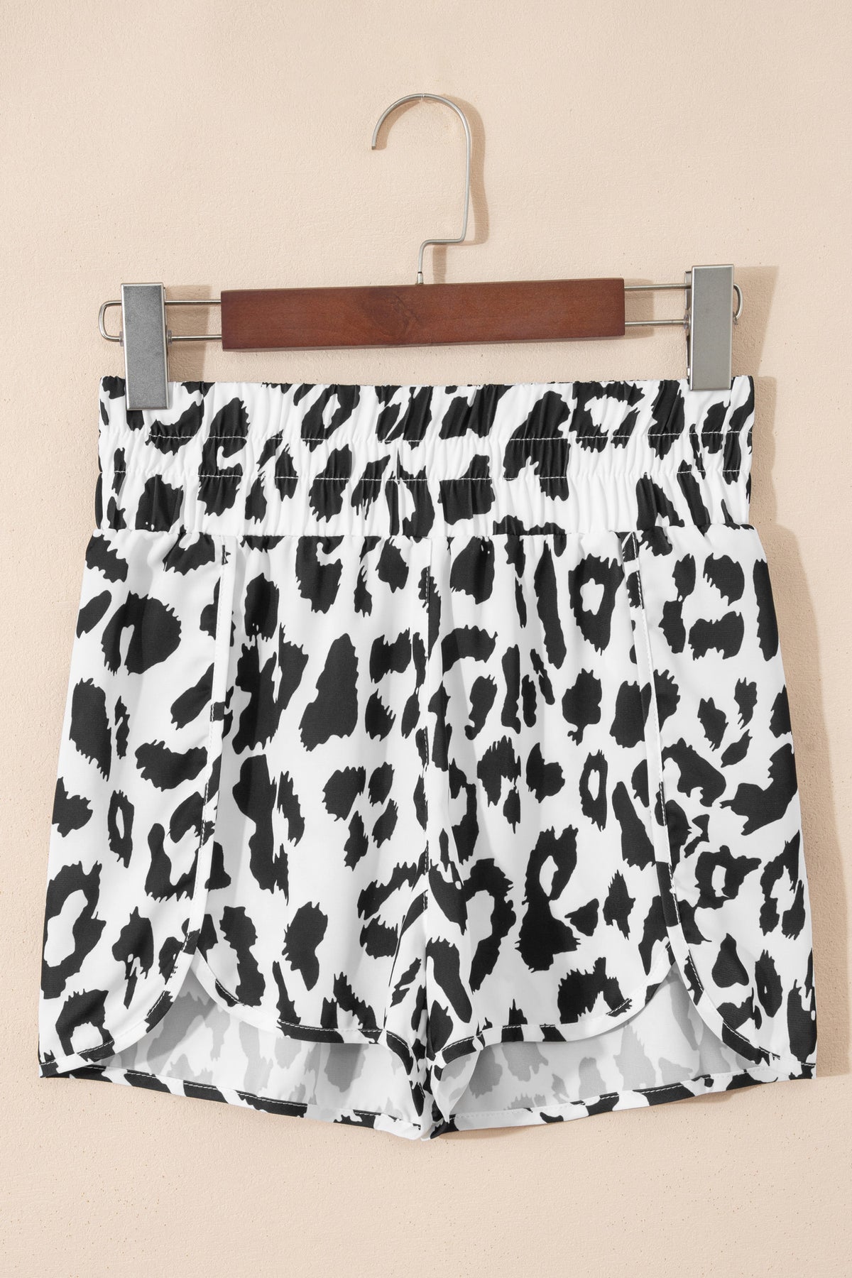 White leopard print high waisted athletic shorts by Dear-Lover, casual bottoms with a comfortable fit and stylish design.