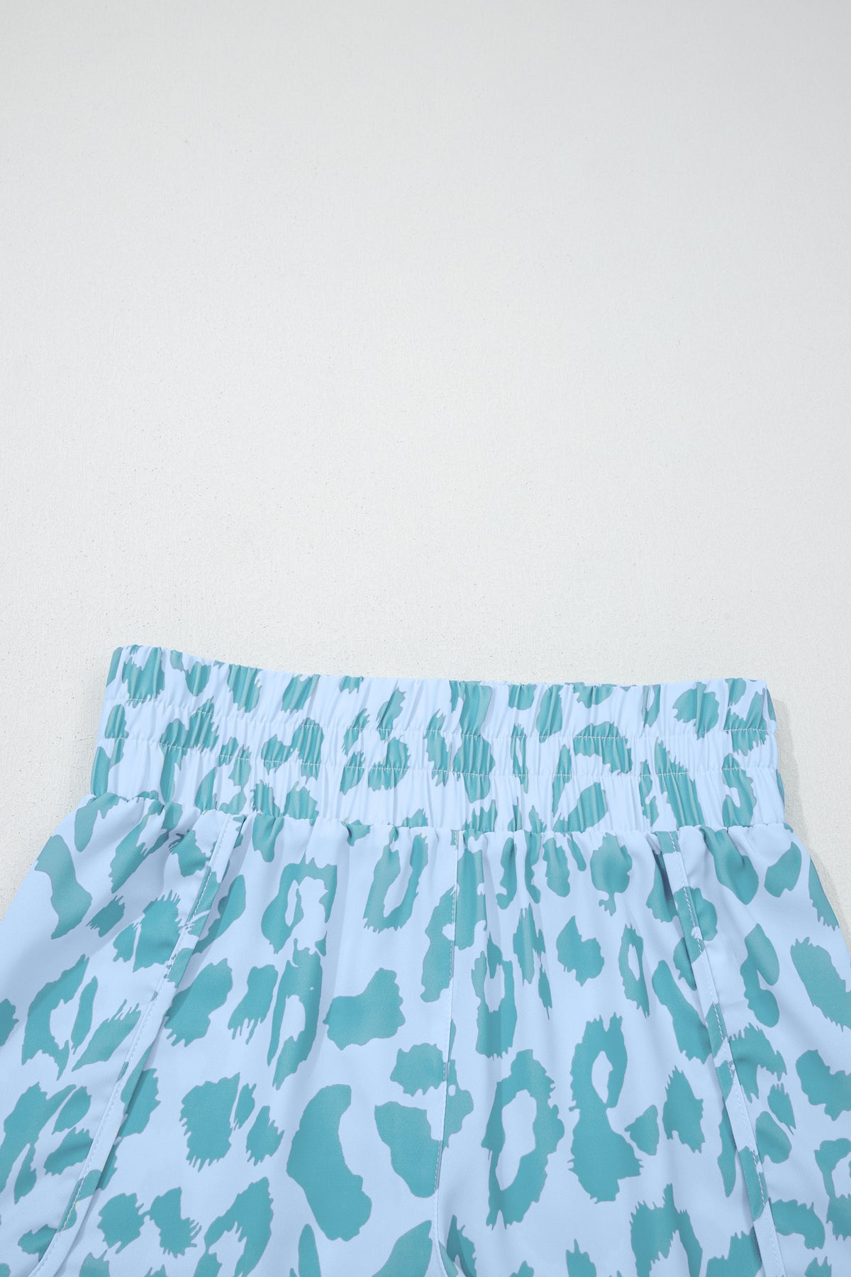 White leopard high-waisted athletic shorts from Dear-Lover, casual bottoms with a comfortable fit and stylish animal print design.