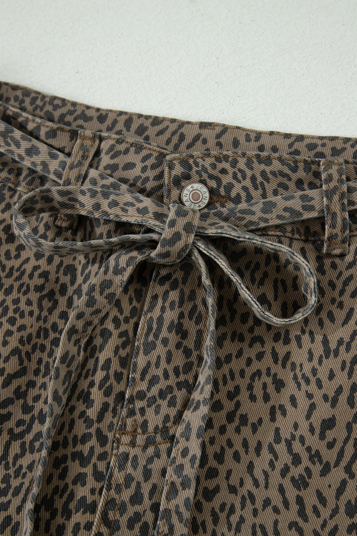 Black leopard print loose denim shorts by Dear-Lover, featuring a casual fit, distressed details, and a comfortable elastic waistband.
