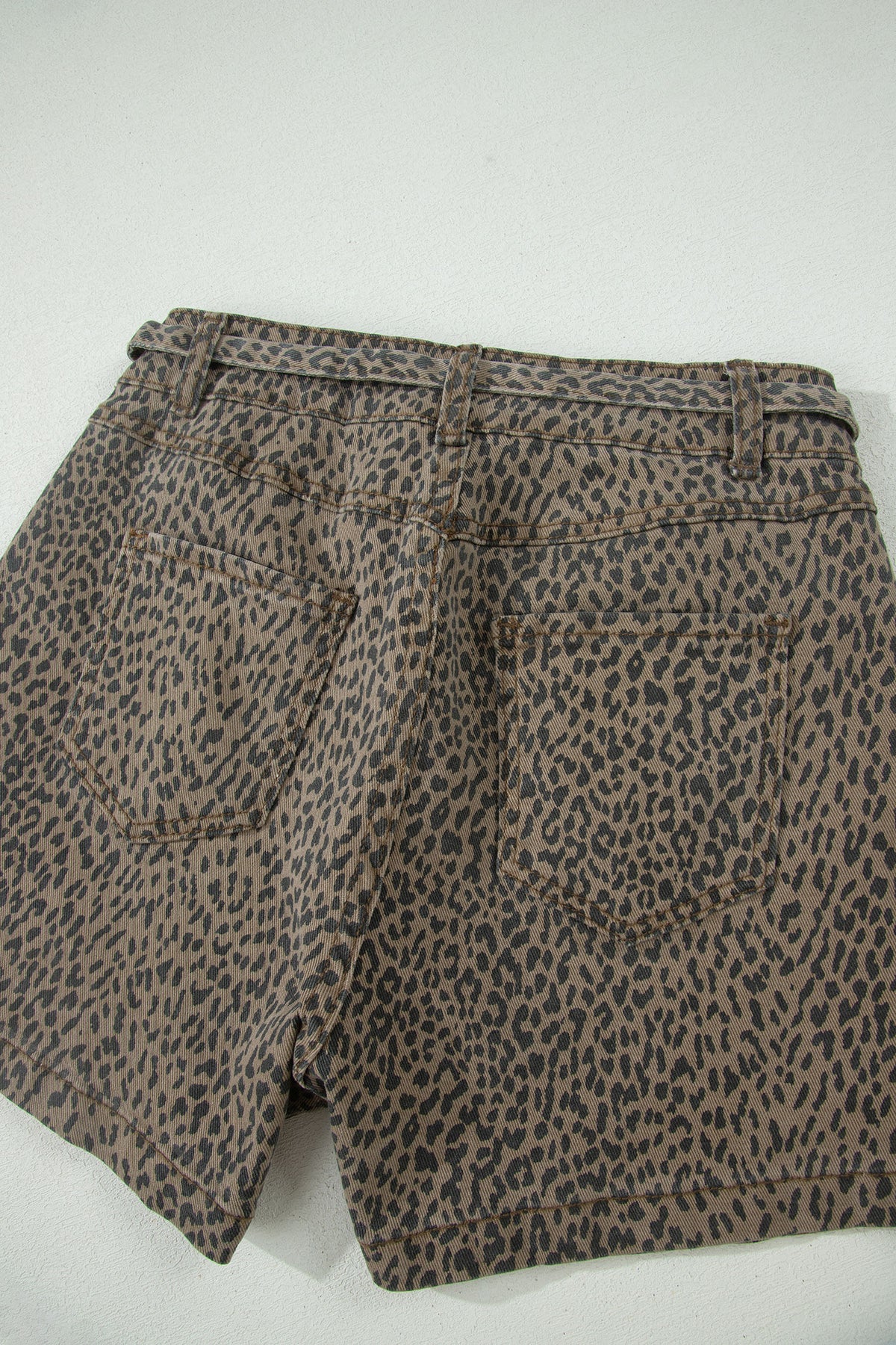 Black leopard print loose denim shorts by Dear-Lover Dropshipping, showing the stylish, casual fit and leopard pattern detail.