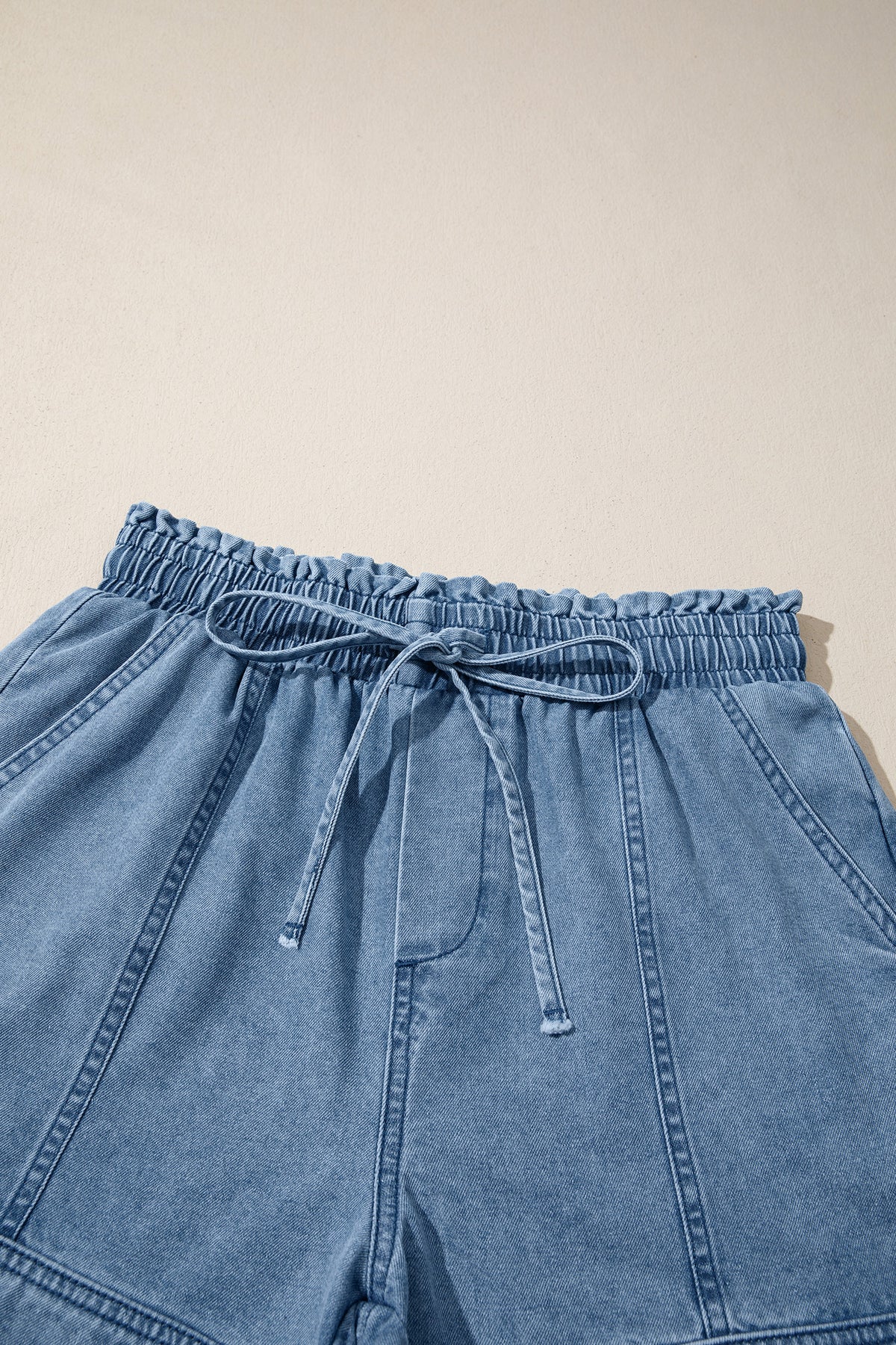 Dusk blue smocked elastic waist denim shorts by Dear-Lover, casual bottoms with cotton-polyester blend and relaxed fit.