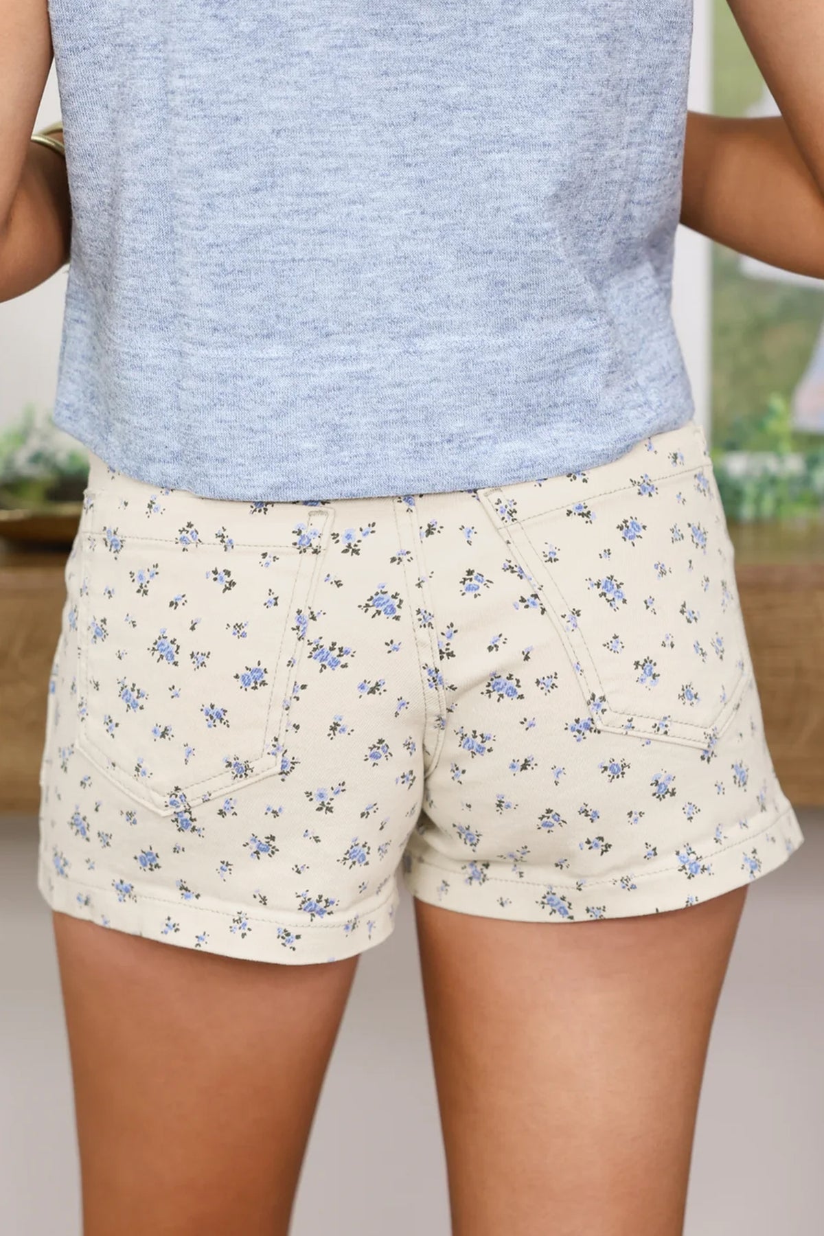 White floral casual denim shorts by Dear-Lover, featuring a cute, relaxed fit with 98% cotton and 2% elastane for comfort.