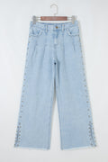 Dear-Lover Blue Wide Leg Jeans with studded side slit, frayed edges, and pocket details, made of cotton and polyester.
