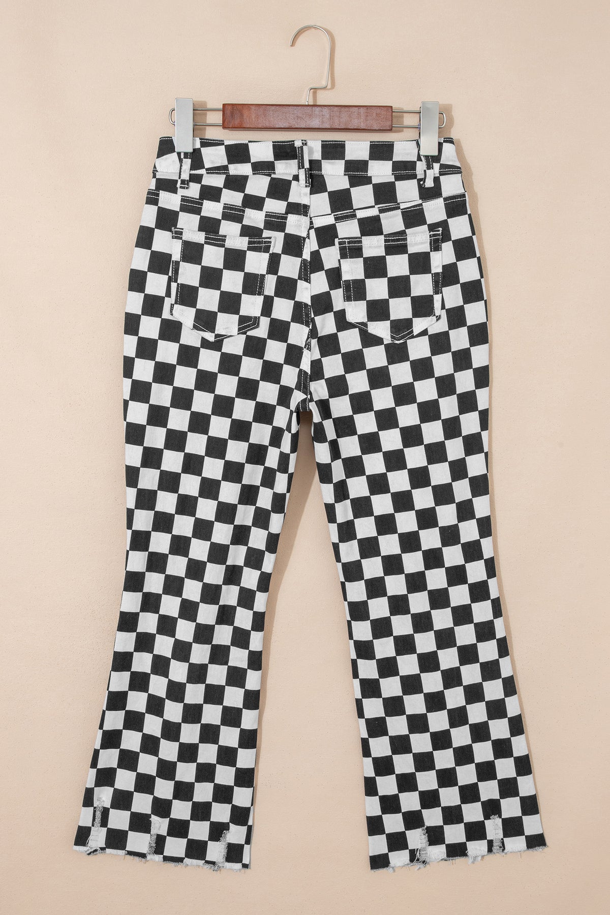 Black checkerboard print distressed raw edge cropped jeans from Dear-Lover Dropshipping, featuring holes and a fitted denim design.