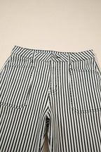 Black stripe patch pocket high waist denim jeans by Dear-Lover, featuring a shift style, stretch cotton blend, and bold stripe detail.