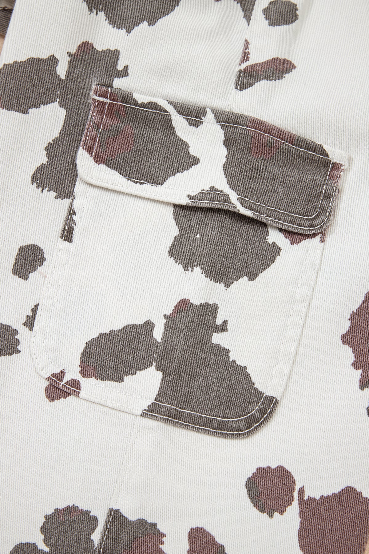Brown Cow Spots printed multi-pocketed jeans by Dear-Lover Dropshipping, featuring a stylish cow print design and comfortable fit.