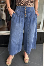Dusk blue high-rise wide-leg denim pants with pleats, buttons, and cropped length from Dear-Lover, made of cotton and polyester.