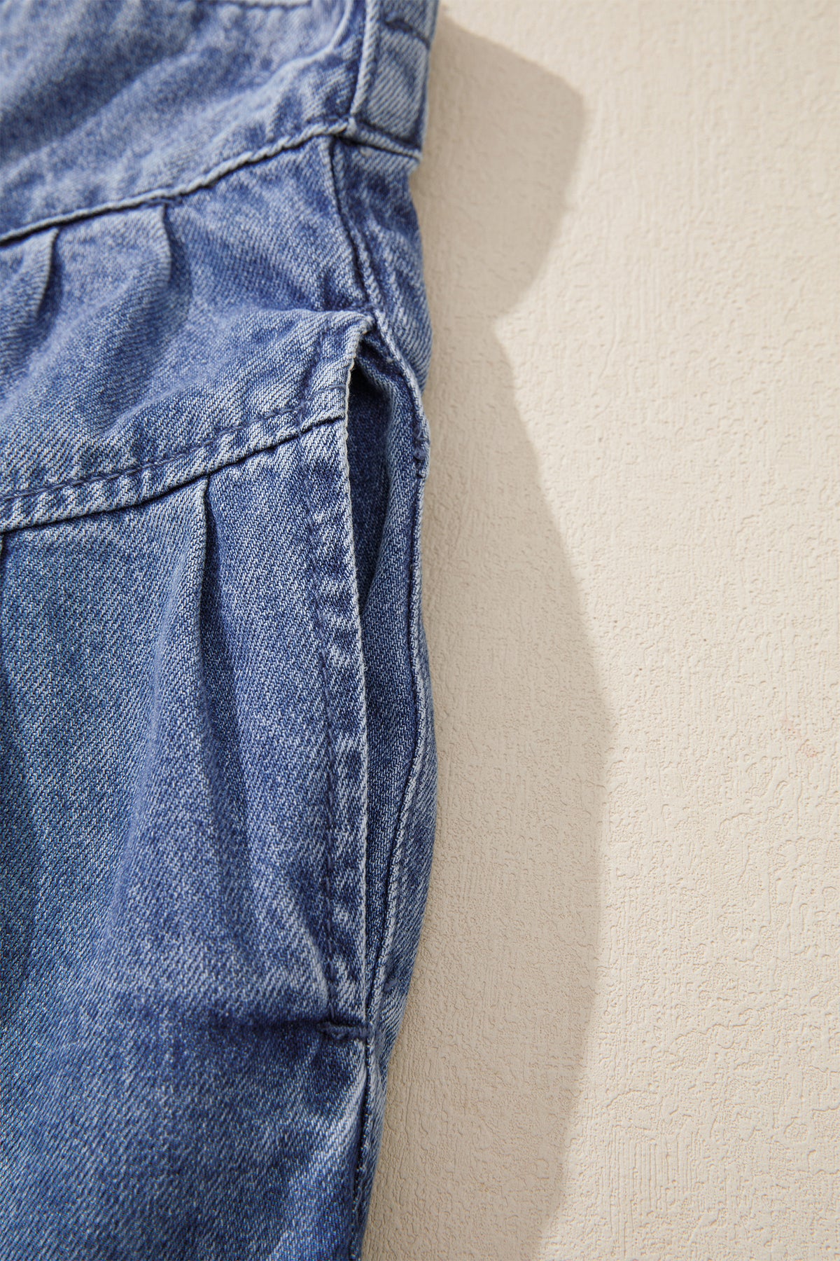 Dusk blue high-rise denim cropped wide-leg jeans with buttons and pleats, made of cotton-polyester blend, by Dear-Lover.