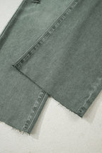 Dear-Lover Four Leaf Clover distressed wide-leg jeans with raw edges, made of cotton and elastane, featuring a subtle four-leaf clover design.